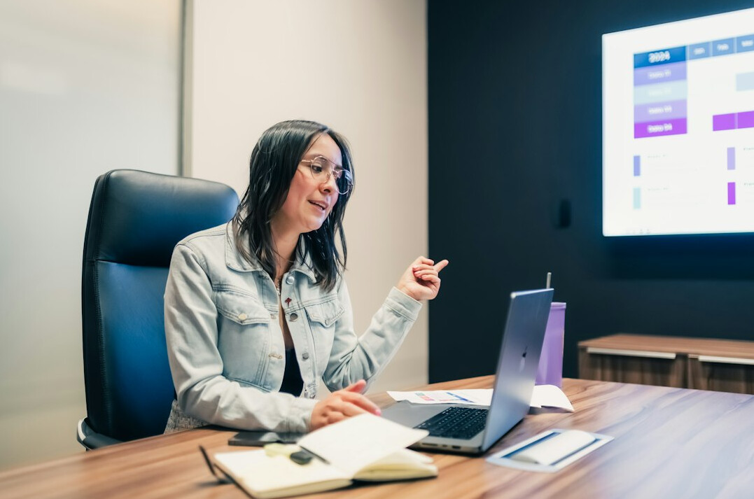 professional woman speaking in meeting